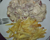 Foto del paso 4 de la receta: Pollo con nata y salchichas