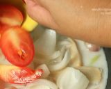 A picture of step 8 of Tom Kha Gai with King Oyster Mushrooms.