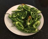 A picture of step 2 of Roasted Pepperoni and cheese stuffed Jalapeños.