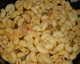 Foto del paso 3 de la receta: Fideos coditos en salsa con arvejas