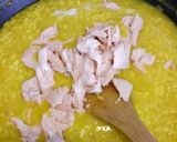 A picture of step 4 of Risotto with fresh salmon fillet and saffron.