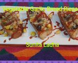 वेजिटेबल गार्लिक ब्रेड पिज्जा (Vegetable garlic bread pizza recipe in Hindi) रेसिपी चरण 10 फोटो