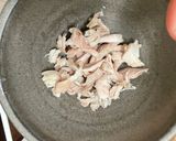 A picture of step 4 of Hainanese chicken and udon noodle broth.