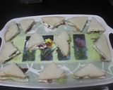 Foto del paso 6 de la receta Triángulos de pan de molde con jamón y queso