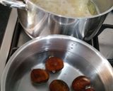 A picture of step 3 of Roast boneless chicken with chestnut, cranberry, apple, brown rice and rum stuffing.