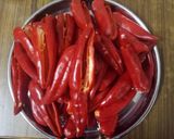A picture of step 2 of Stuffed red chilli pickle.