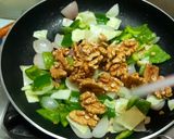 A picture of step 3 of Walnut Schezwan Stir Fry.