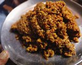 A picture of step 2 of Dana Methi stuffed Mirchi.