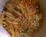 A picture of step 1 of Potato and Carrot Fritters.