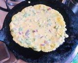A picture of step 4 of Besan ka chilla.