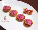 A picture of step 9 of Corn Canapés with Pink frost.