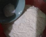 A picture of step 3 of Orange Marble Swiss Roll.