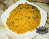 A picture of step 5 of Jallof cous cous wt vegetables.