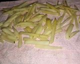 A picture of step 3 of Frozen masala fries.