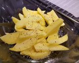 A picture of step 1 of Home made oven chips!!!.