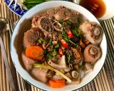A picture of step 4 of Banh Canh with Pork Hock, Pork Tail Bones, and Pork Skin.