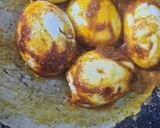 A picture of step 5 of Masala egg.