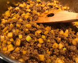 A picture of step 2 of Curried beef pitas with cucumber sauce.
