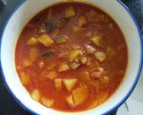 A picture of step 4 of Potato - Brinjal Curry.
