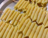 A picture of step 2 of Cheesy Pasta Sticks.