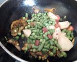 A picture of step 2 of Mix vegetable masala khichdi.
