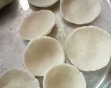 A picture of step 4 of Pitha (Bengali Coconut-Stuffed Pitha).