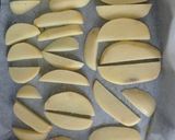 Foto del paso 2 de la receta: Filetes de pollo empanados con patatas al horno