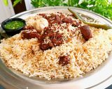 صورة لخطوة 10 من وصفة طبخ الكبسة البيضاء باللحم بألذ طريقة