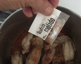 Foto del paso 5 de la receta: Arroz caldoso de pollo y conejo, con espinacas y alcachofas