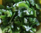 A picture of step 2 of Simla Mirchi sabji.
