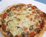 Une image de l'étape 7 de Tarte tomates cerises champignons mozarelle.
