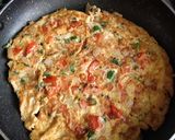 A picture of step 5 of Masala omelette.