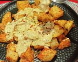 A picture of step 8 of Cheesey Spicy Garlic Potato.
