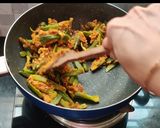 A picture of step 13 of Besani bhindi fry.