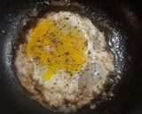 A picture of step 3 of 15 Cent Diner Fried Egg Sandwich with cheese.
