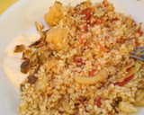 Foto del paso 2 de la receta: Paella de bacalao, coliflor y ajos tiernos
