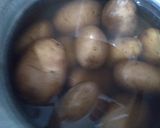 A picture of step 1 of Aloo ka bhurta.