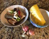 A picture of step 1 of Braised Mackerel with Pineapple.