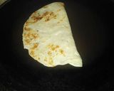 A picture of step 24 of Coconut Badam Puranpoli.