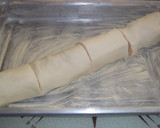Foto del paso 9 de la receta: Tronco de hojaldre relleno de lomo adobado y queso