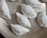 A picture of step 11 of Assamese Mohura Pitha.