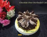 A picture of step 9 of Chocolate Oreo Overloaded Cake.