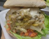 Foto del paso 13 de la receta: Sándwich con muchos vegetales y pollo🥙🥯🧅🍆🍗🥪