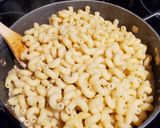 A picture of step 6 of Creamy Sausage Alfredo.
