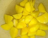A picture of step 1 of Buttered potatoes suya wadges.