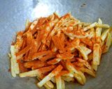 A picture of step 4 of Masala french fries.