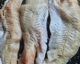 Foto del paso 3 de la receta: Merluza al horno con papas a la provenzal y salsa cheddar