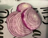 Une image de l'étape 4 de Courgettes et duo d’oignons grillés au zaatar et herbes aromatiques.