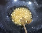 A picture of step 3 of Coconut candy (kwakumeti).