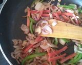 A picture of step 4 of Suji Upma with veggies.